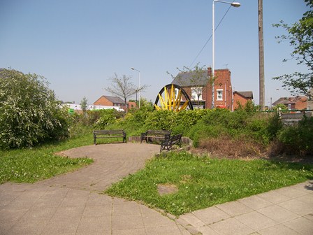 Pit Wheel to Commemorate Pye Hill Colliery with Memorial Garden in foreground